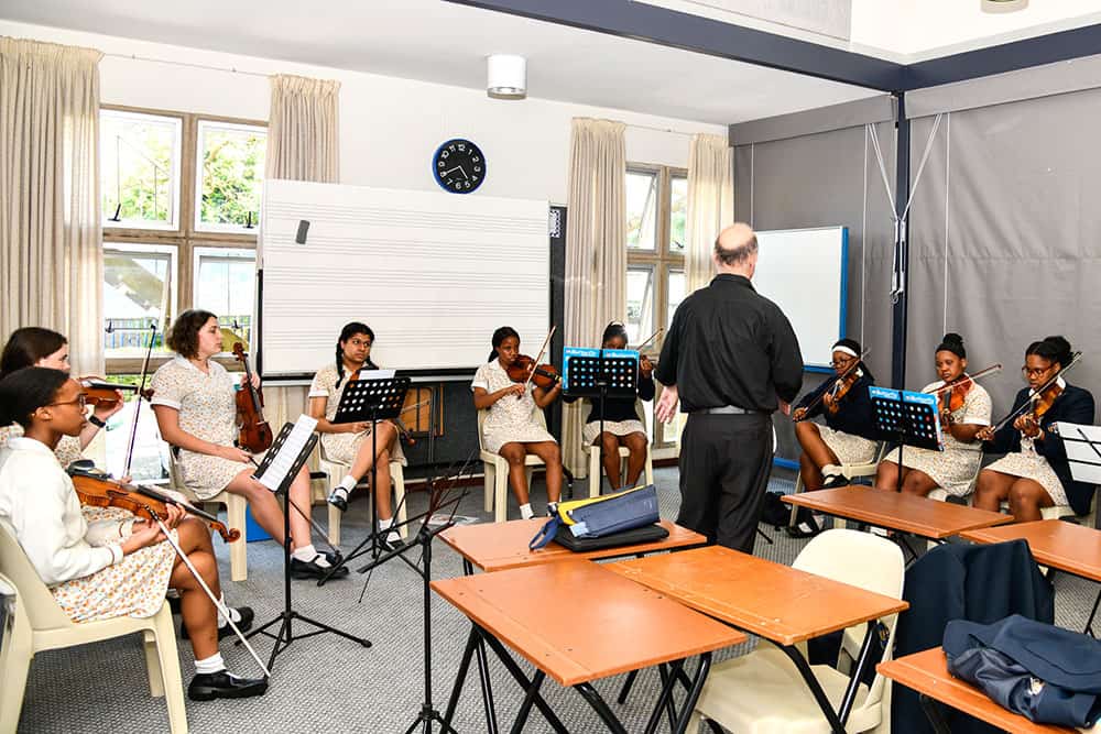 Girls during a music class at TWC private school